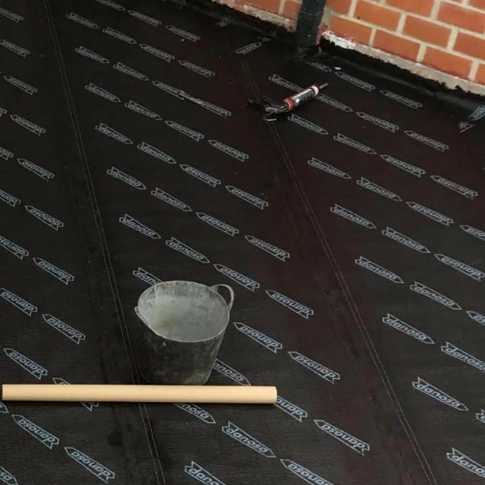 Colocación de tela asfáltica y filtros de suelo